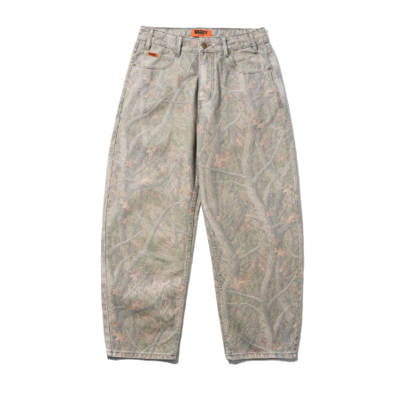A pair of Butter 120th Ranger Baggy Denim Jeans in a forest camo pattern, shown on a white background with a second view of the same jeans on the right.